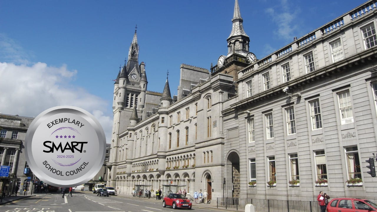 Aberdeen City Council building with SMART Exemplary School Council badge for 2024–2025.