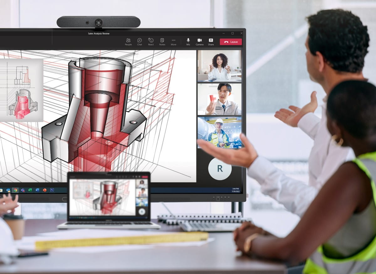 Professionals discuss engineering design on a SMART interactive displayduring a Teams video conference, highlighting virtual collaboration tools.