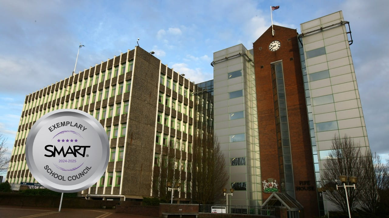 Fife Council building with clock tower, marked with SMART Exemplary School Council 2024–2025 badge.
